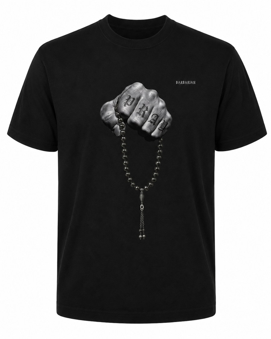 Tespih Pray Fist T-Shirt black front view with grayscale PRAY fist graphic and prayer beads print